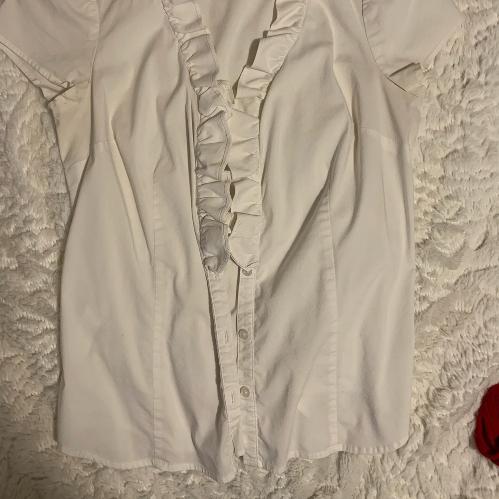 White shirt sleeve ruffle button down.